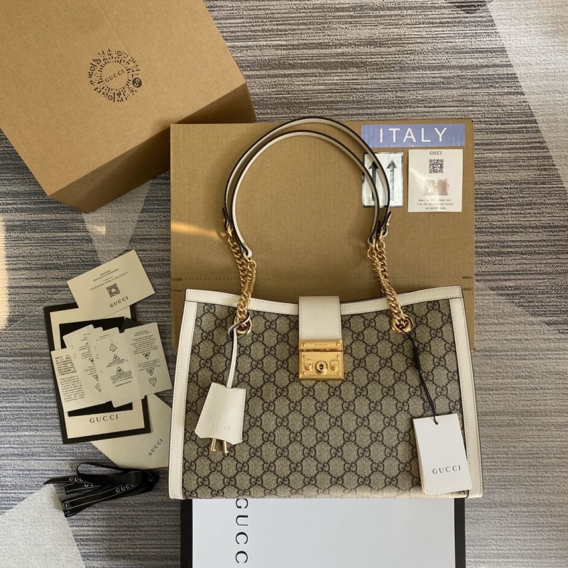 G*u*i top handle bags